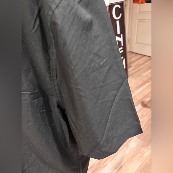 Simple black men’s shirt only worn once 2XL—dress it up
or dress it ups it down! - Picture 6 of 6